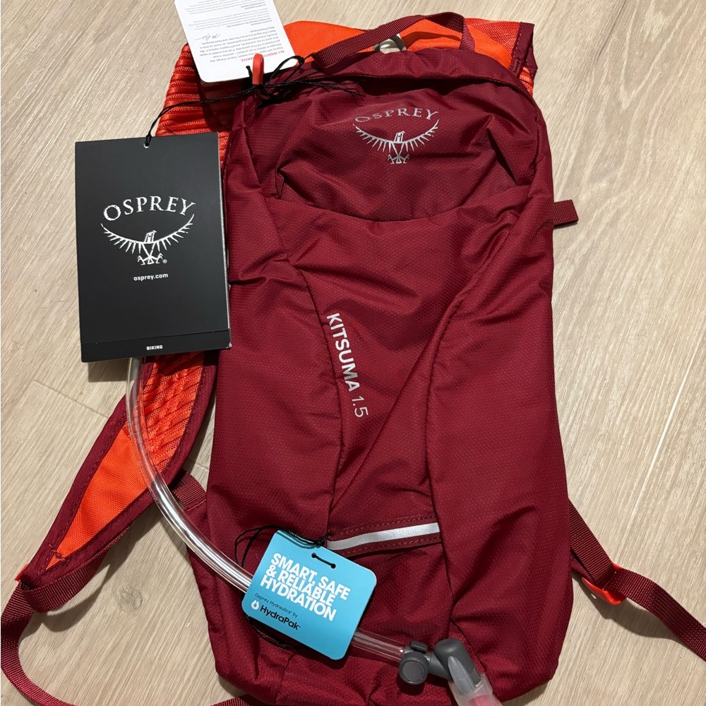 OSPREY Kitsuma 1.5 Hydration Pack in Burgundy with Orange Accents